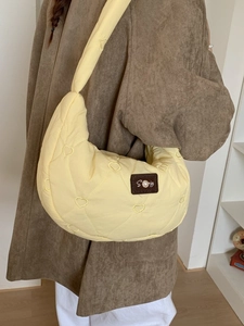 Quilted heart pattern light yellow puffer shoulder bag with pearl logo detail