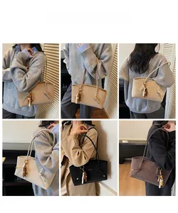 Detailed views of vintage suede tote bags in four colors with beaded tassel accents