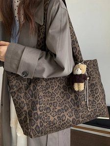 Large leopard print canvas tote bag with a cute bear charm for daily commute and casual style