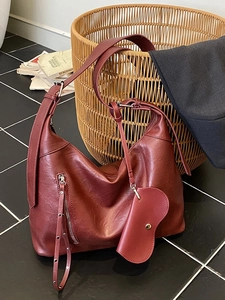 Deep red vintage hobo shoulder bag set with silver rivets and small hanging coin pouch