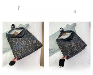 Detailed comparison of large and small leopard print canvas tote bags in deep blue color