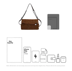 Capacity view of quilted suede shoulder bag showing storage for phone, umbrella and cosmetics