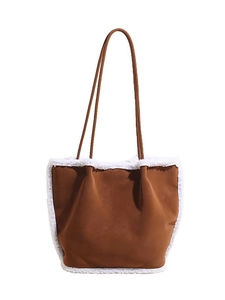Brown faux suede tote bag with white faux fur trim and long shoulder straps