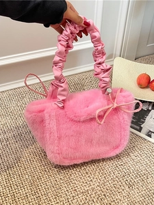 Chic pink faux fur tote bag for women with ruched handles and side bow accents