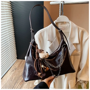 Dark brown oil wax leather hobo bag with silver chain and cute plush dog pendant