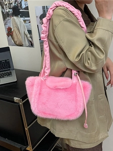 Furry plush crescent shoulder bag in bright pink with ruffled strap for autumn and winter