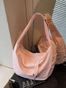 Pink large capacity crossbody dumpling bag with plaid fabric and wide shoulder strap