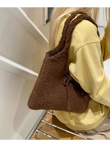 Dark brown knitted tote bag with bow detail, stylish autumn winter underarm handbag