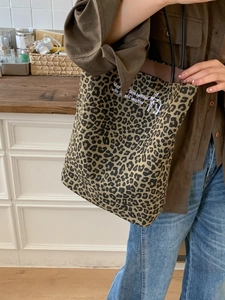 Leopard print canvas tote bag with deer graphic and long shoulder straps for daily commute