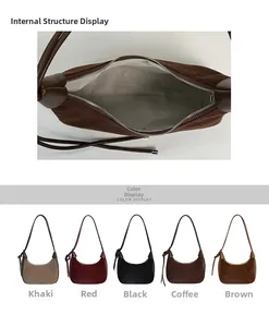 Detail view of smooth zipper closure and spacious interior lining of retro hobo bags