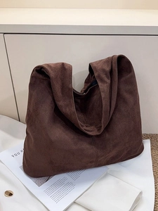 Vintage dark brown suede tote bag for women with a minimalist bucket shape design