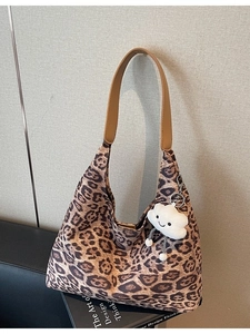 Retro leopard print faux suede shoulder bag with brown strap and cloud plush charm