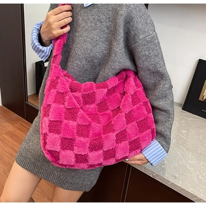 Detail of rose pink plush checkerboard pattern tote bag with soft faux fur texture
