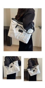 Détail du grand sac cabas matelassé blanc avec anses noires et étiquette de mode