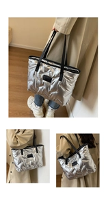 Détail du sac cabas matelassé argenté avec finition métallique brillante et poignées