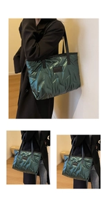 Détail du sac cabas matelassé vert avec texture en V et finition métallique