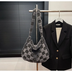 Detail of grey checkered plush tote bag showing soft faux fur texture and large capacity