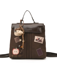 Sac à dos rétro en nylon marron foncé et cuir avec broderie et breloque peluche