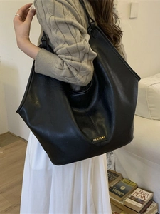 Classic black PU leather tote bag for women with minimalist shoulder strap design