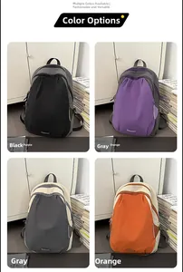 Detailed grid view of color-block backpacks in black, purple, gray, and orange colors