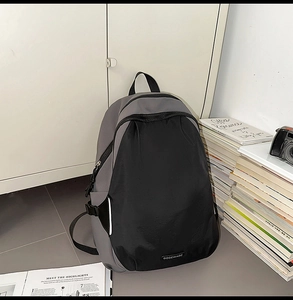 Detailed view of durable contrast nylon stitching and side buckle on the travel backpack