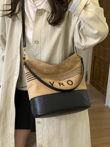Brown suede and black quilted leather bucket bag with YRO letter print and crossbody strap