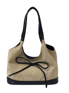 Minimalist vintage bucket bag with beige textured body and black bow handles