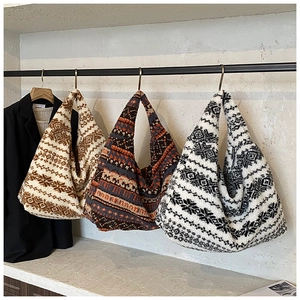 Detailed texture of jacquard plush tote bags with Nordic patterns in various colors