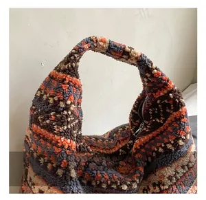 Detail view of the colorful faux fur tote bag showing the soft texture and sturdy handle