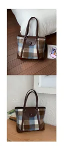 Detailed view of British style checkered tote bag with brown leather stitching and textures