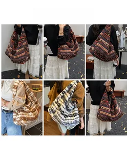 Detail view of large plush tote bags in bohemian patterns and soft shearling textures