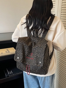 Vintage leopard print canvas backpack with take it easy embroidery and drawstring closure