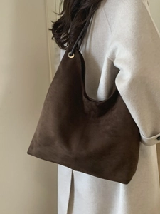 Retro brown oversized shoulder tote bag in matte suede with silver eyelet detail