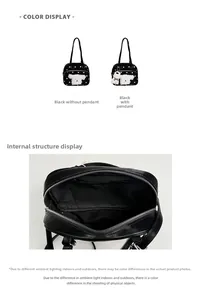 Detail view of black polka dot handbag with cute puppy patch and inner zipper pocket