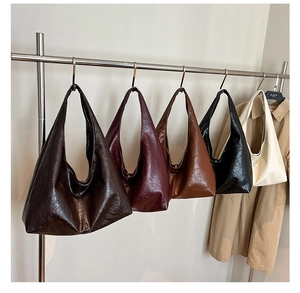 Detailed display of five color options for large capacity hobo bags with soft leather texture