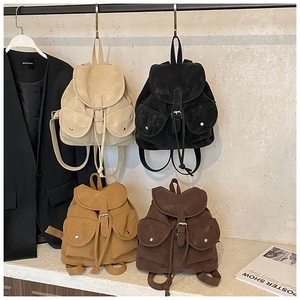 Collection of vintage matte leather backpacks in beige, black, camel and coffee brown