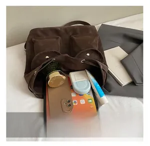 Detail of retro brown backpack interior showing large capacity for tablet and daily items