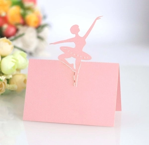 Pink laser-cut ballerina place card made of pearlescent paper for wedding table seating