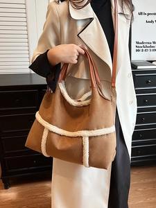 Vintage brown suede tote bag with white faux shearling trim and adjustable strap
