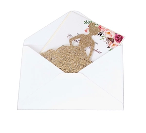 Detail of silver laser cut girl silhouette invitation with glitter paper and floral card