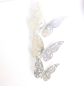 Detailed laser-cut pattern on 3D metallic butterfly wall stickers with folding wings