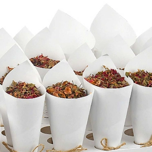 Detail of kraft paper wedding petal cones with natural jute rope and dried flower filling