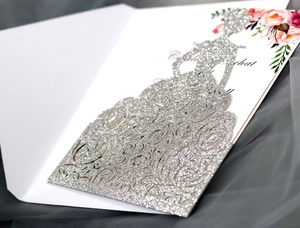 Detailed laser-cut silver glitter wedding invitation card with bride silhouette