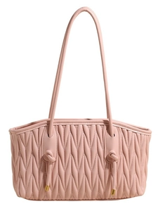 Pink pleated tote bag with signature wave quilting and gold-tipped decorative knots