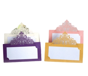 Laser-cut lace wedding place cards in gold pink and purple pearlescent paper finish