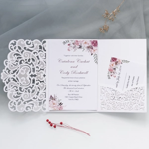 Laser cut wedding invitation with white lace sleeve and purple floral inner card