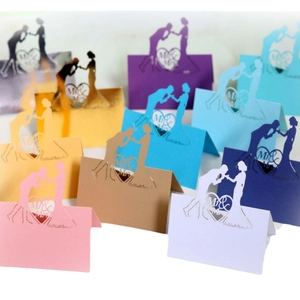 Laser cut Mr & Mrs heart wedding place cards with silhouettes in various colors