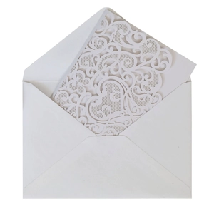 Elegant white laser-cut wedding invitation featuring intricate heart and floral patterns