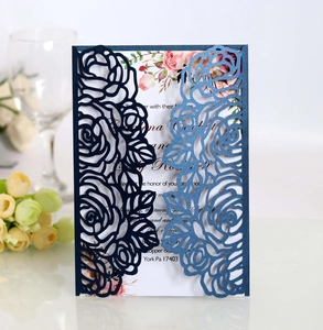 Laser cut navy rose patterned wedding invitation with pink floral inner card