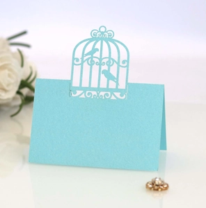 Marque-place découpé au laser avec cage à oiseaux bleu clair pour table de mariage